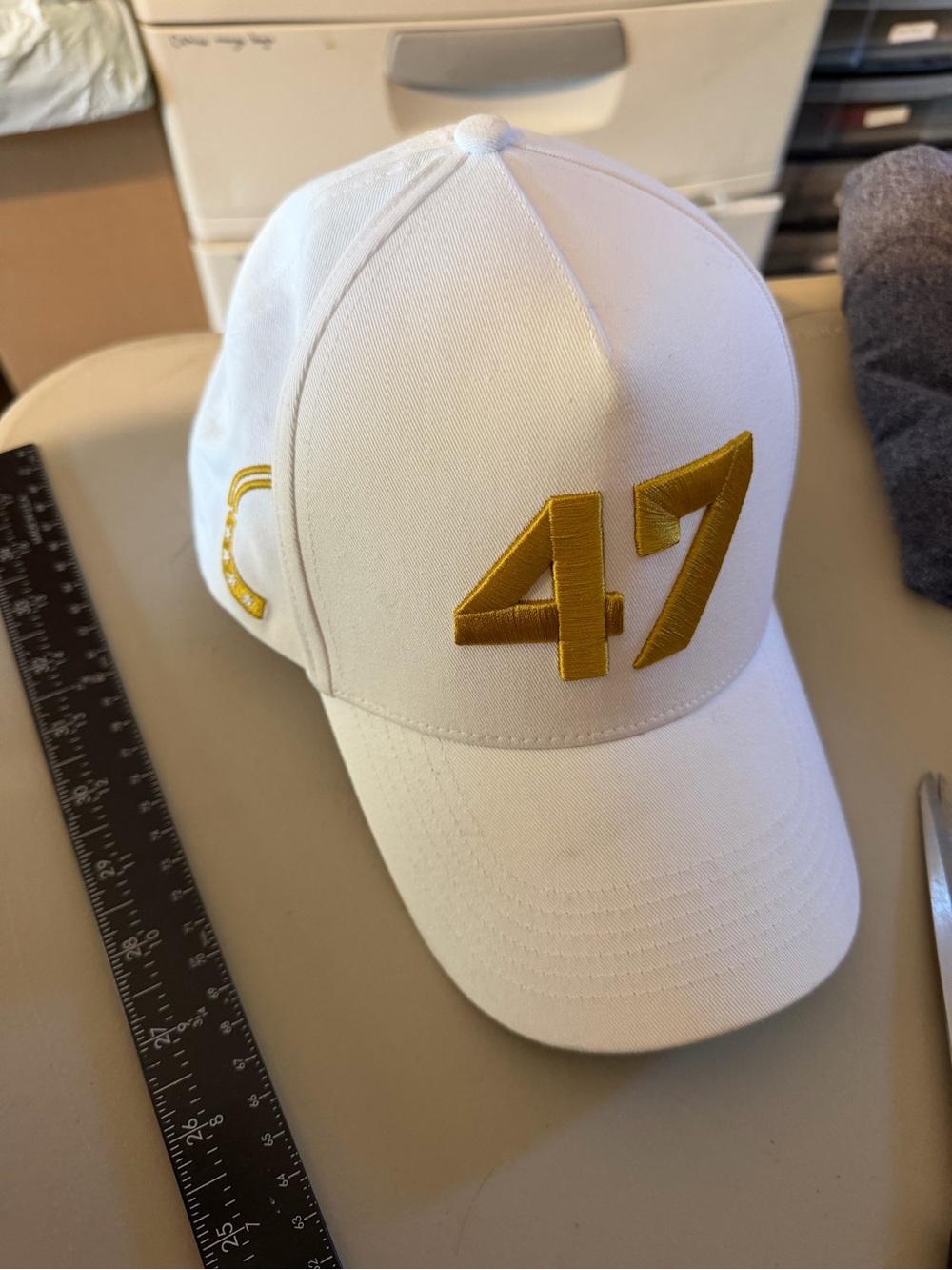 White Baseball Cap with Gold '47' Embroidery